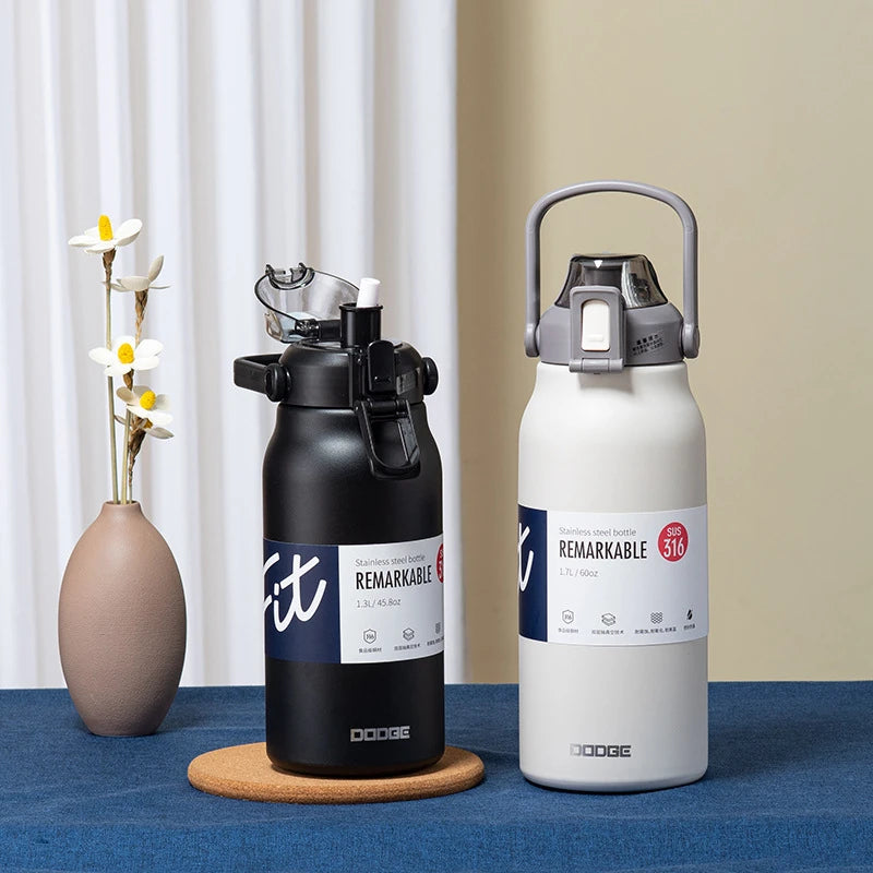 Garrafa térmica de aço inoxidável com alça - 1000ml